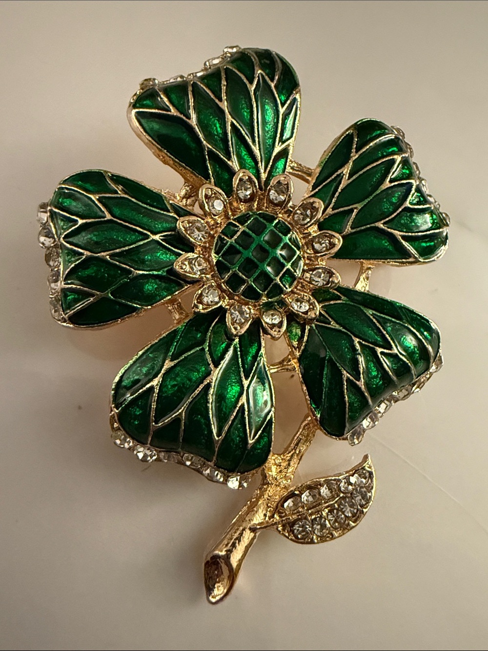 Gold-Tone Green Enamel Floral Brooch with Crystal Accents